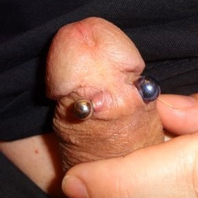 Exploring the Social and Intimate Dynamics of Genital Piercings for Chastity